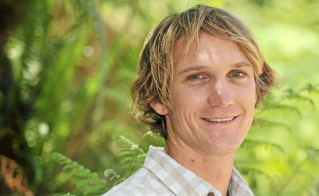 BACK IN THE WATER: Daniel Hewitt restored to health and, inset, after his 6m fall. BACK IN THE WATER: Daniel Hewitt restored to health and, inset, after his 6m fall.